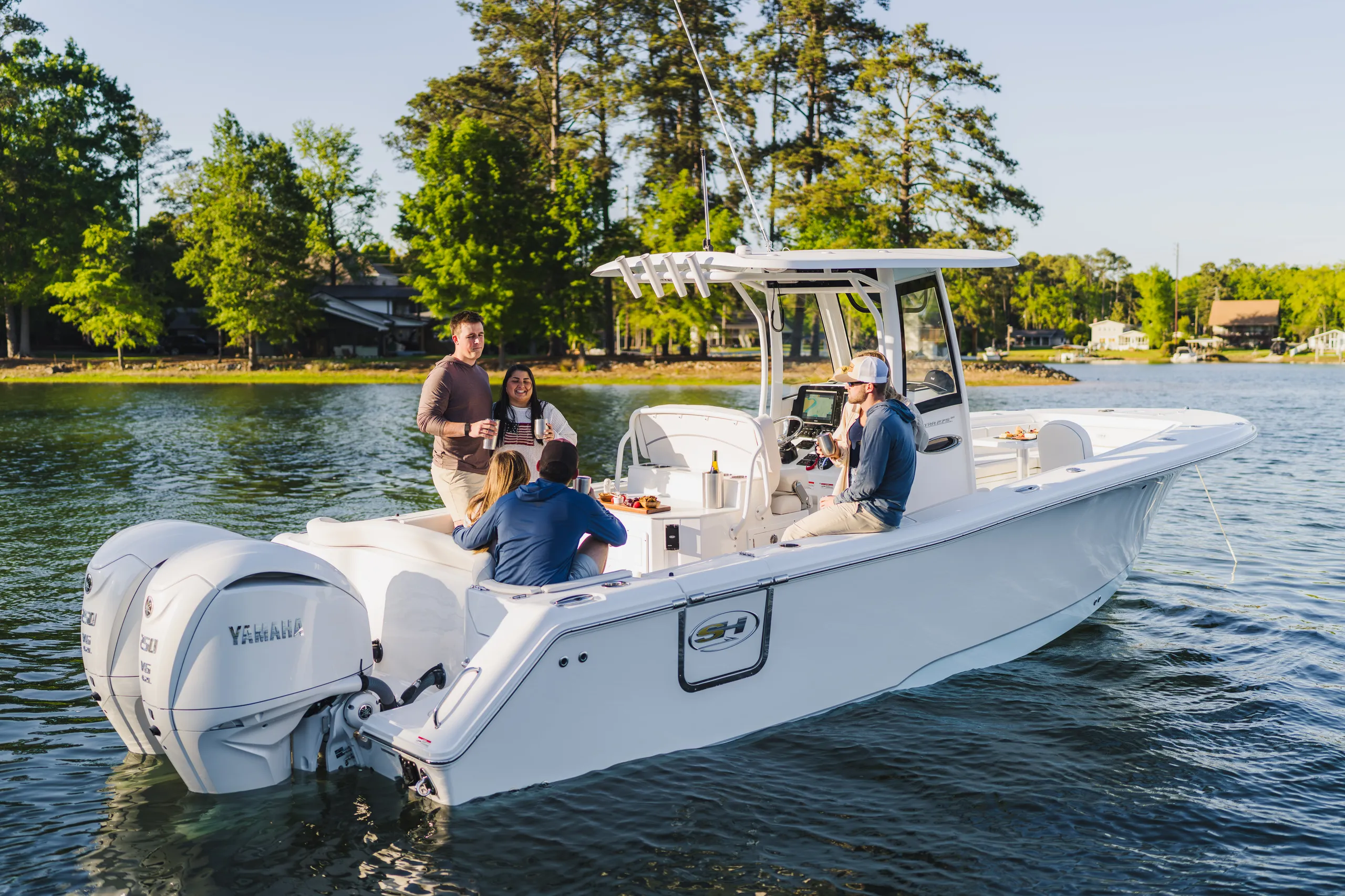 Family enjoying a day aboard a Sea Hunt center console boat